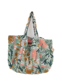 Vintage Suzani beach bag with embroidery in light green, dark green, pink and ochre, back view
