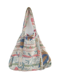 Vintage Suzani beach bag with embroidery in pink, blue, green and sand, side view