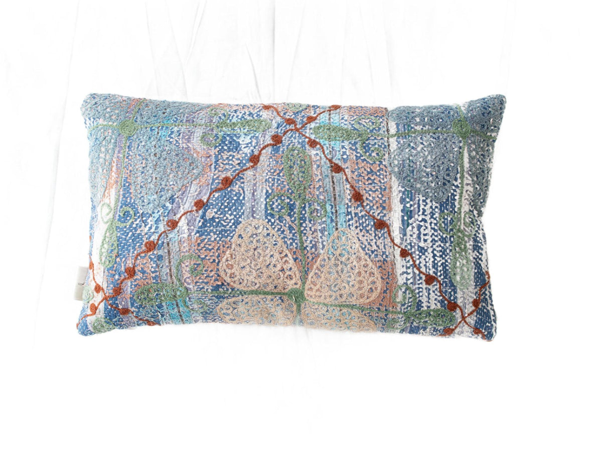 Unique suzani pillowcase 30x50 cm in blue and green squares with beige patterns and orange thread lines on ethnic boho vintage texture