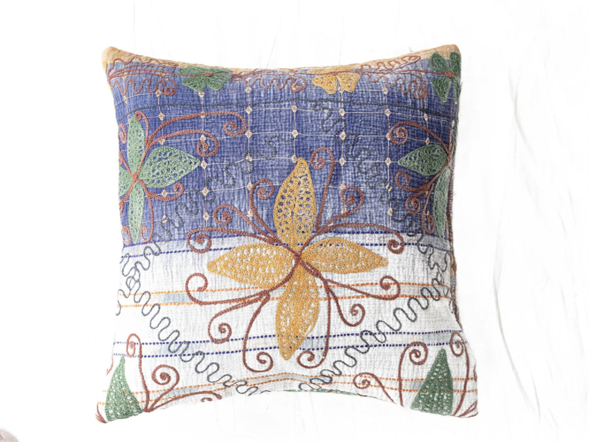 Unique suzani pillowcase 50x50 with blue checkered fabric and colorful oriental vintage embroidery in orange brown swirls green leaves and yellow flowers